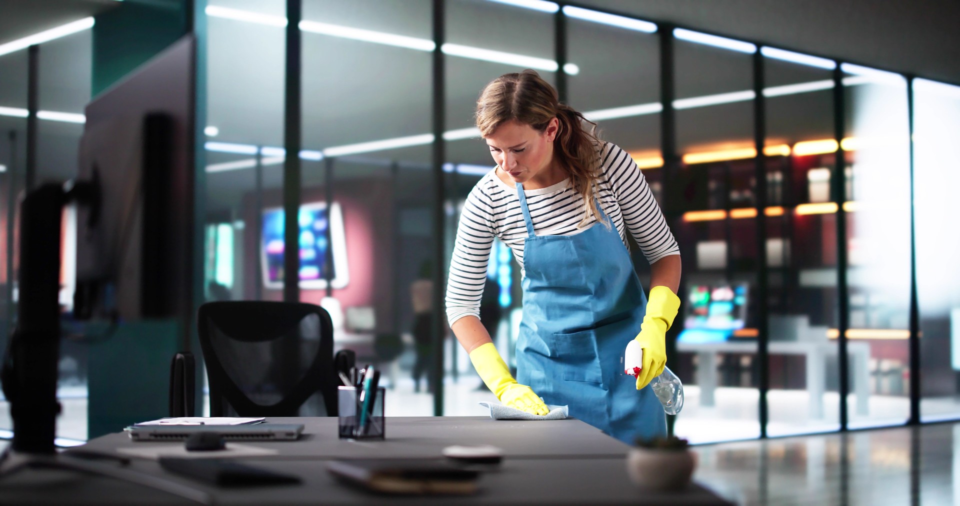Janitor Cleaning Office Desk